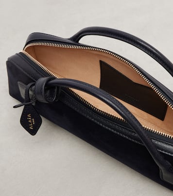 Le Teckel Small calf hair clutch | Alaïa