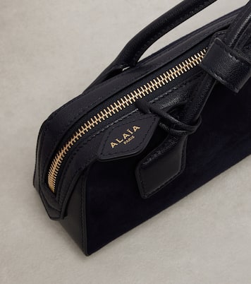 Le Teckel Small calf hair clutch | Alaïa