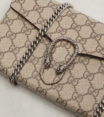 Dionysus GG Supreme clutch | Gucci