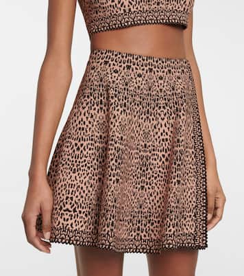 Mini-jupe en jacquard à motif léopard | Alaïa