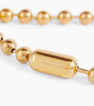 Logo stainless steel dog necklace in gold Balenciaga Mytheresa