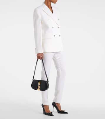 Pantaloni slim in lana a vita alta | Versace