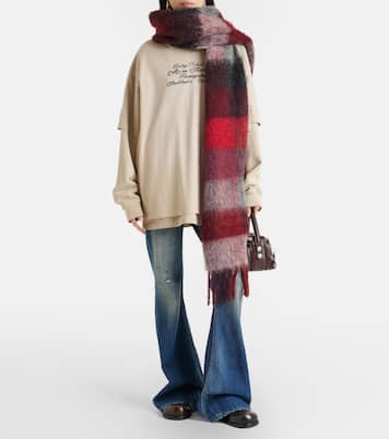 2025F distressed flared jeans | Acne Studios