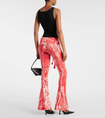 Raze low-rise tie-dye flared pants | KNWLS