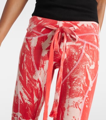 Raze low-rise tie-dye flared pants | KNWLS