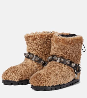 Embellished shearling ankle boots | Miu Miu