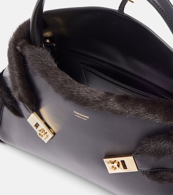 Hugh Medium shearling-trimmed leather shoulder bag | Ferragamo