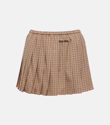 Logo pleated checked cotton miniskirt | Miu Miu