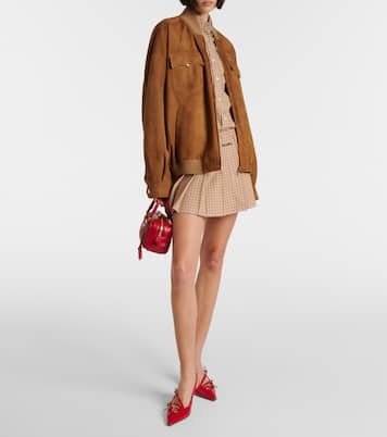 Logo pleated checked cotton miniskirt | Miu Miu
