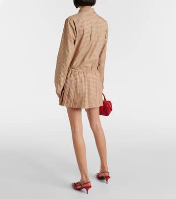 Logo pleated checked cotton miniskirt | Miu Miu