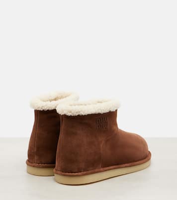 Shearling-lined suede ankle boots | Miu Miu