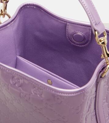 GG Emblem Medium metallic leather bucket bag | Gucci