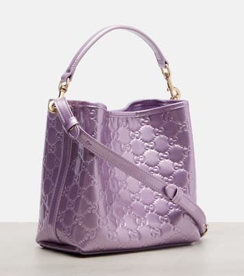 GG Emblem Medium metallic leather bucket bag | Gucci
