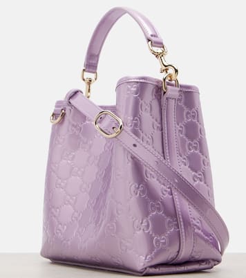 GG Emblem Medium metallic leather bucket bag | Gucci
