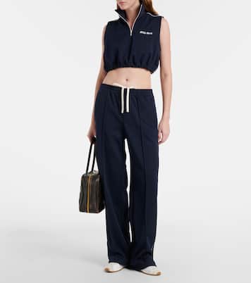 Plume suede-trimmed sneakers | Miu Miu