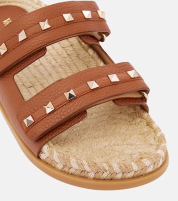 Rockstud leather and raffia slides | Valentino Garavani