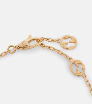 Collana Interlocking G in oro 18kt con onice e diamante | Gucci