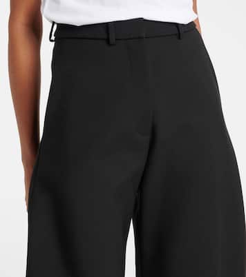 Pantaloni a gamba larga in lana | Alaïa