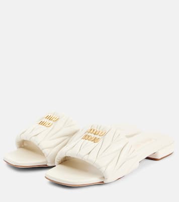 Mules en cuir matelassé à logo | Miu Miu