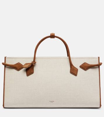 Le Teckel leather-trimmed canvas tote bag | Alaïa