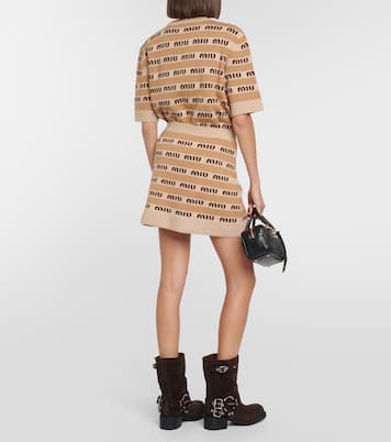 Mini-jupe en laine vierge à logo | Miu Miu