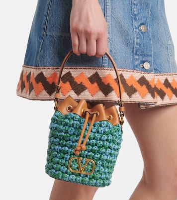 VLogo Mini raffia-effect bucket bag | Valentino Garavani