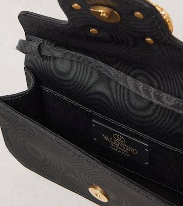 VLogo Signature embellished moiré clutch | Valentino Garavani