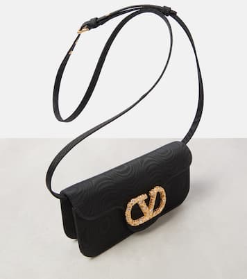 VLogo Signature embellished moiré clutch | Valentino Garavani