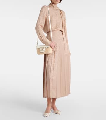 Bolso Locò Small con ribete de piel | Valentino Garavani