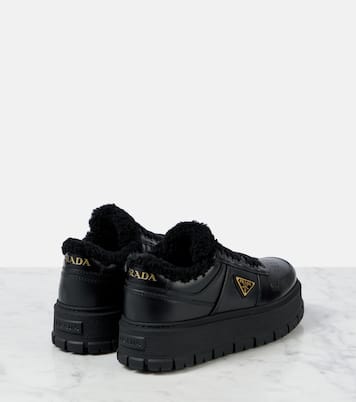 Shearling-lined leather platform sneakers | Prada