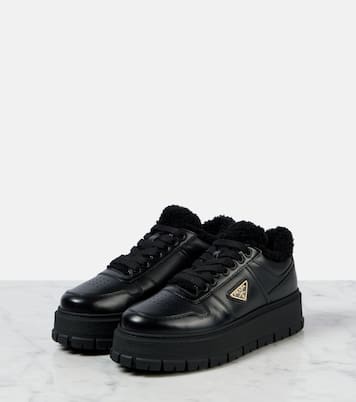 Shearling-lined leather platform sneakers | Prada