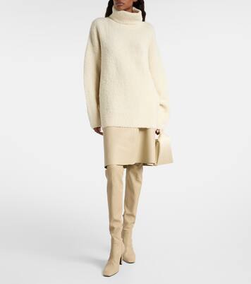 Alpaca and wool-blend bouclé turtleneck sweater | Toteme