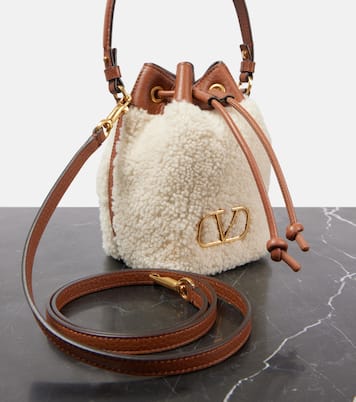 VLogo Signature shearling bucket bag | Valentino Garavani