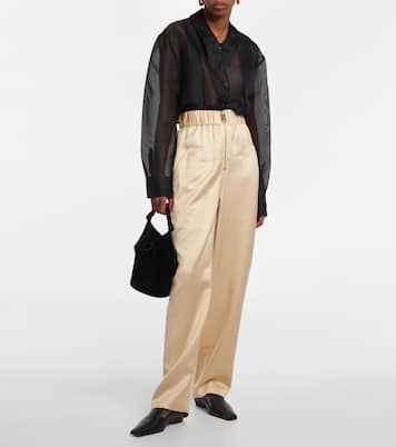 Pantaloni a gamba larga Felton in raso a vita alta | Khaite