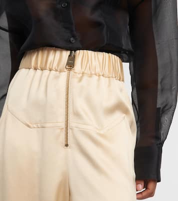 Pantaloni a gamba larga Felton in raso a vita alta | Khaite