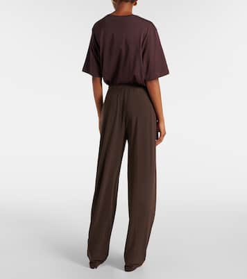 Pleated high-rise tapered pants | Norma Kamali