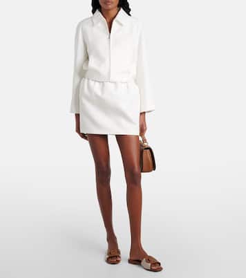 Pantoletten Interlocking G mit Leder | Gucci