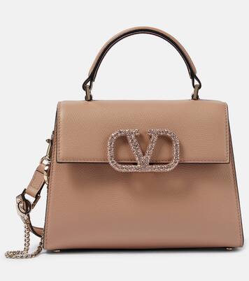 VSling Small embellished tote bag in pink Valentino Garavani Mytheresa