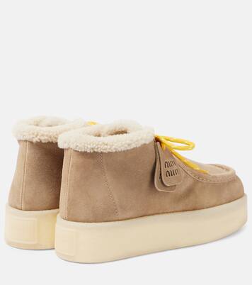 Shearling-lined leather platform ankle boots | Miu Miu