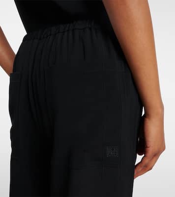 Pantaloni a gamba larga a righe | Toteme