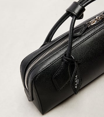 Le Teckel Small leather clutch | Alaïa