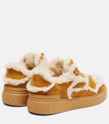 Shearling-trimmed suede sneakers | Balmain