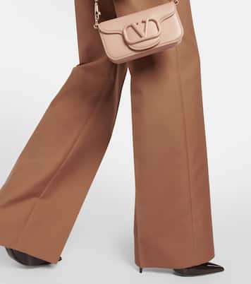Pantaloni a gamba larga e vita alta | Valentino