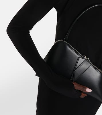 Shoulder pad jersey top | Norma Kamali