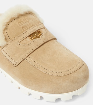 Slippers in suede e shearling | Miu Miu