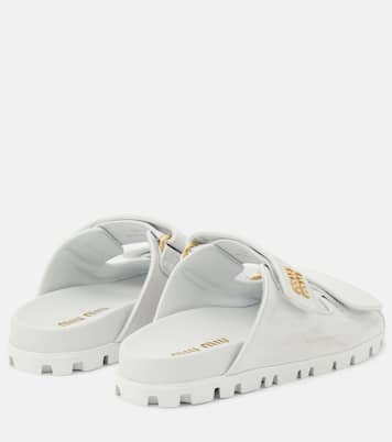 Sandali distressed in pelle con logo | Miu Miu