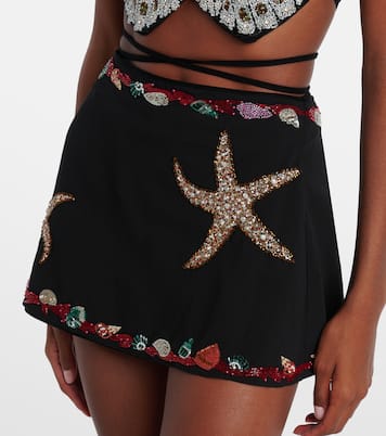 Calypso embellished wrap skirt | Clio Peppiatt