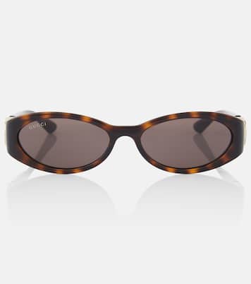 Occhiali da sole Interlocking G ovali | Gucci