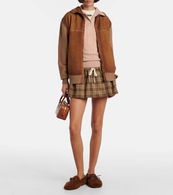 Suede-trimmed shearling boat shoes | Miu Miu