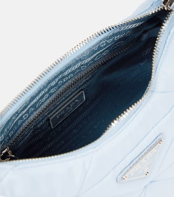 Quilted shoulder bag in blue Prada Mytheresa